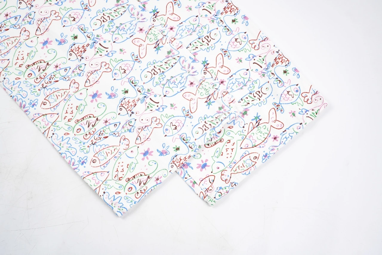 CHANEL Cream White Graffiti Straight-Leg Jeans product photo from LabelPicks