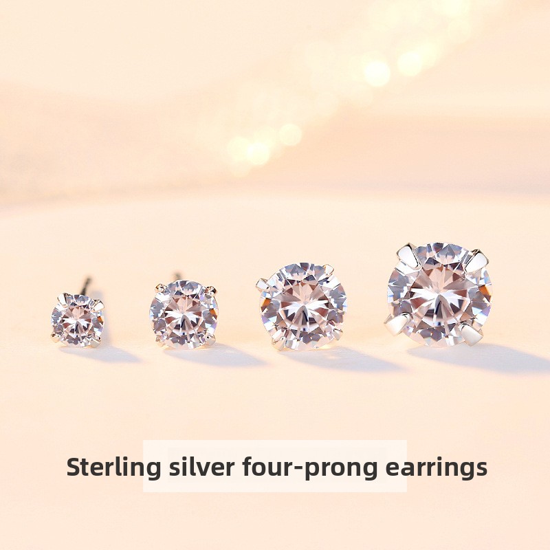 Four-prong cubic zirconia earrings, made of sterling silver, lightweight, luxurious, delicate, and elegant, suitable for newly pierced ears, featuring a single dazzling stone