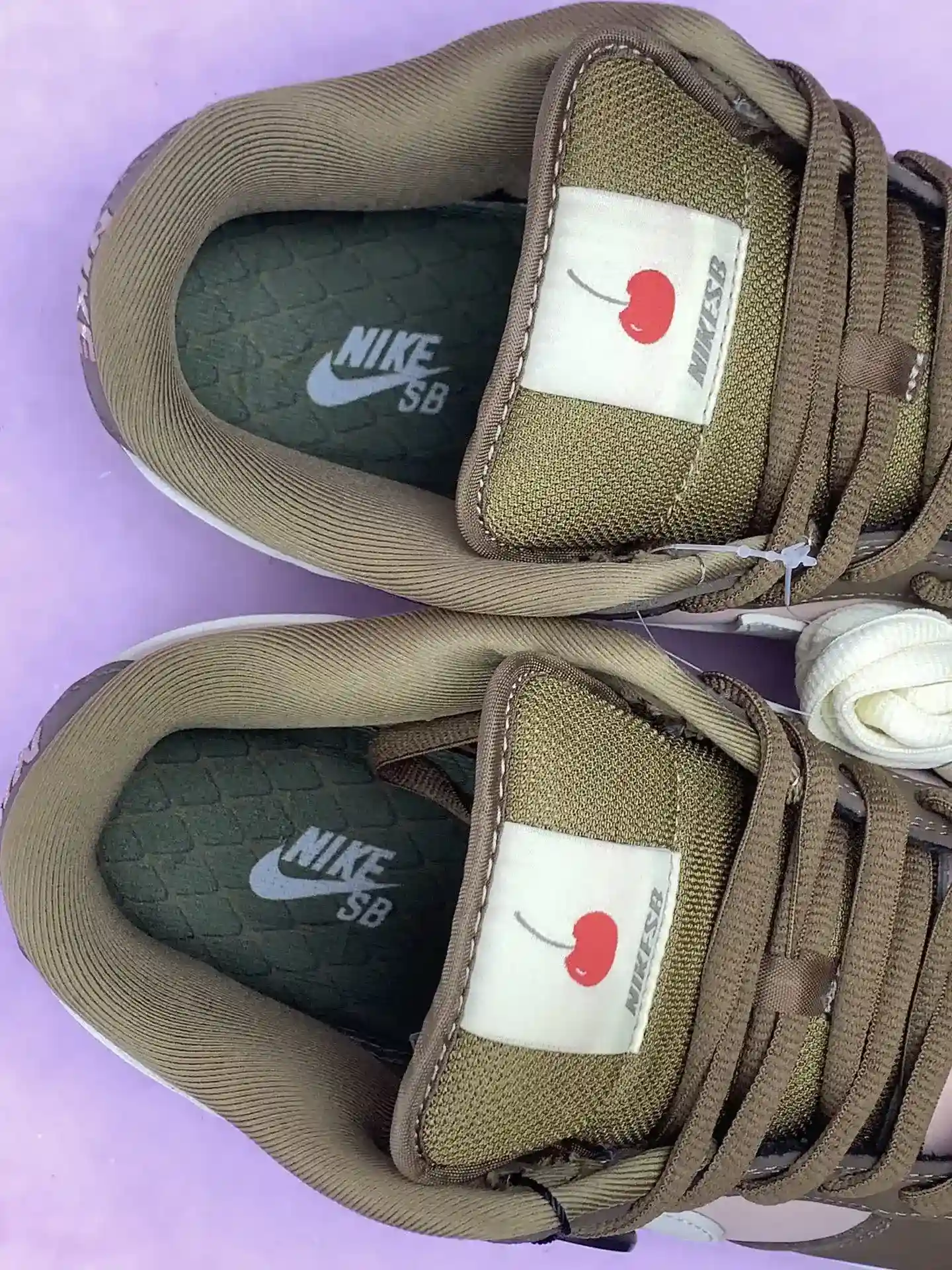 Stussy x Nike SB Dunk Low Pro 'Cherry' Shoes product photo from LabelPicks