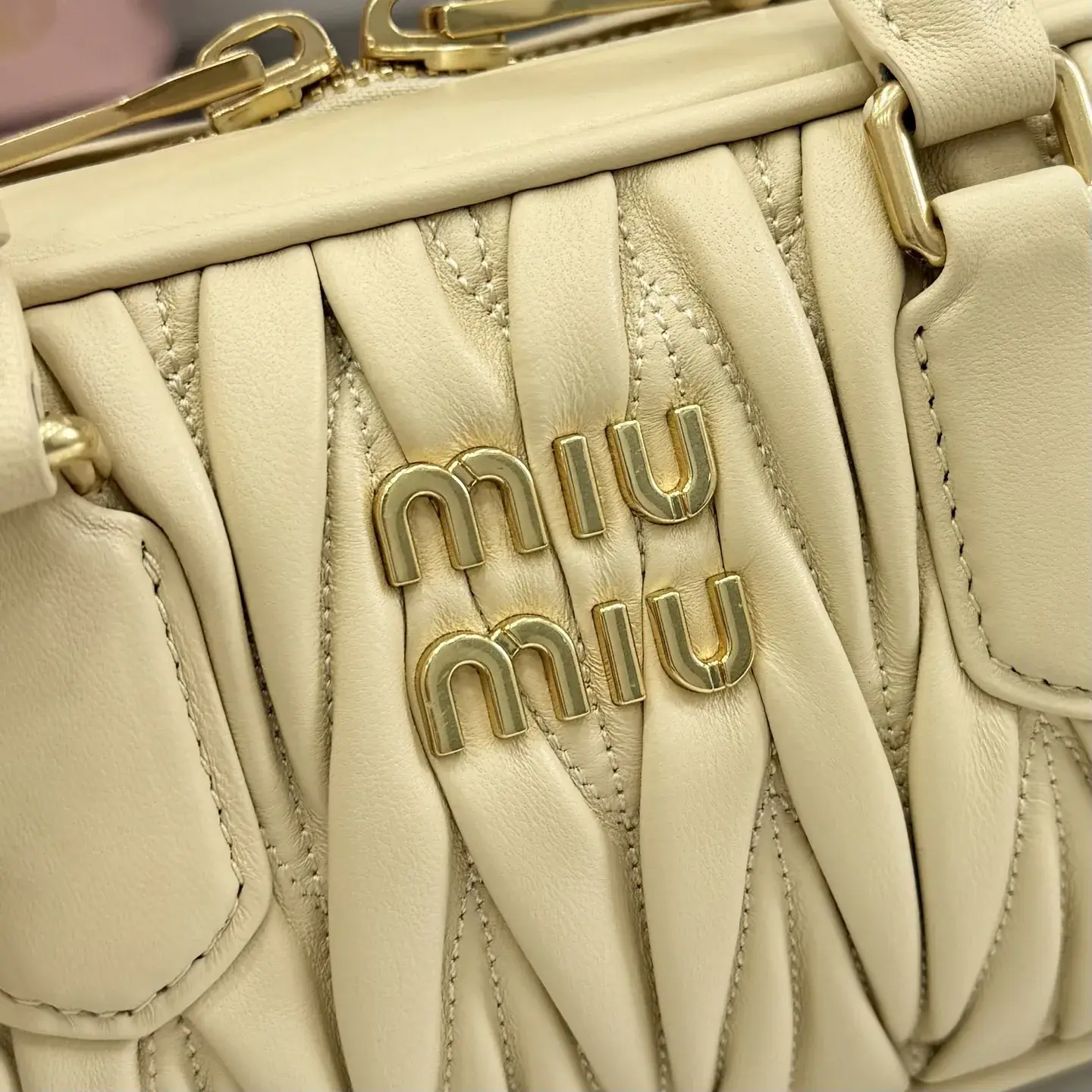 Miu Miu Lambskin Matelasse Top Handle Bag product photo from LabelPicks