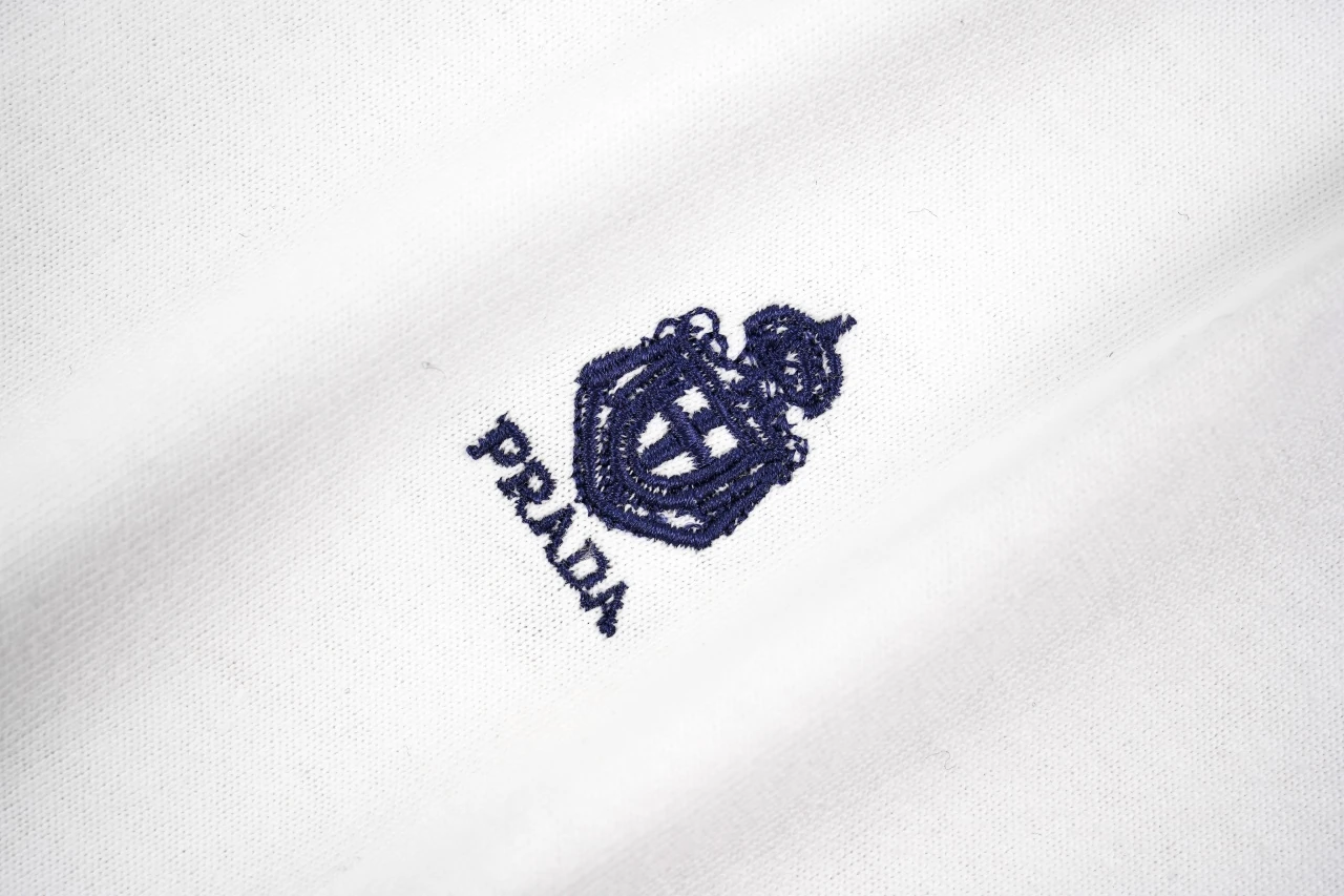 Prada White Distressed Badge Embroidered T-Shirt product photo from LabelPicks