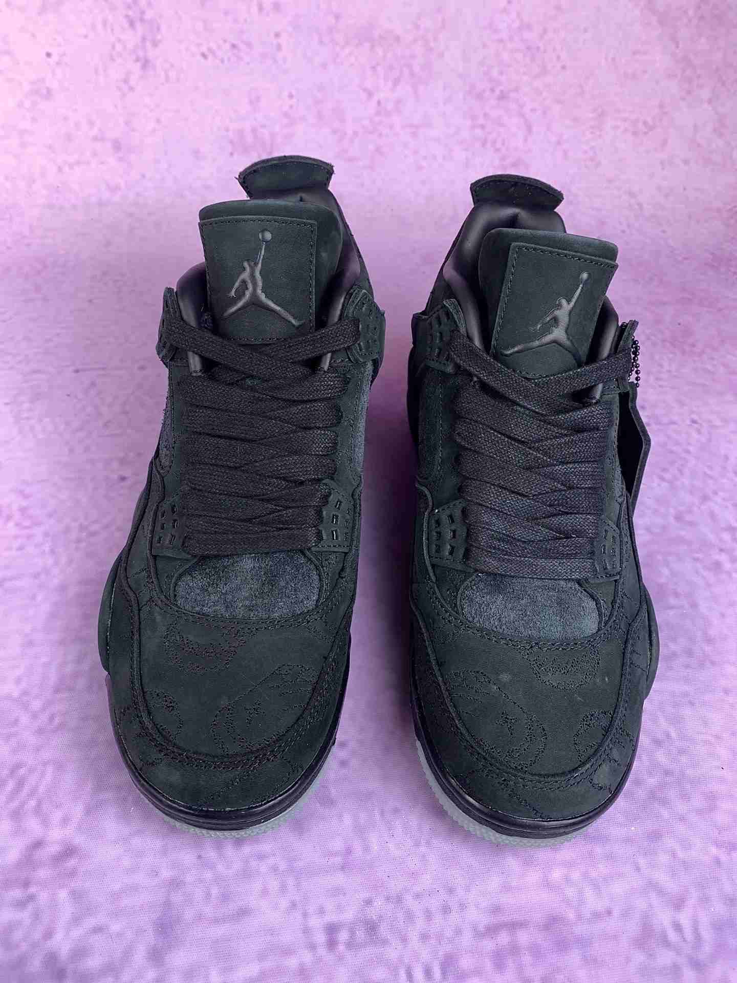 KAWS x Air Jordan 4 “Black” Shoes