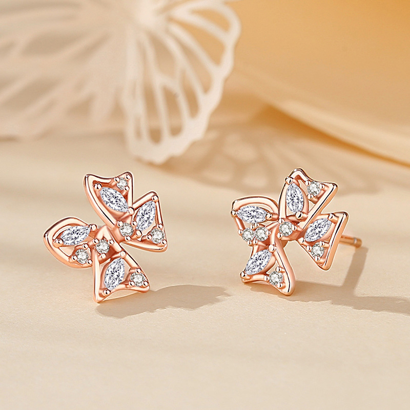Twisted knot bow earrings for women, made of 925 sterling silver, fashionable, lightweight, and luxurious, with a unique and stylish design featuring floral patterns, exuding an elegant aura