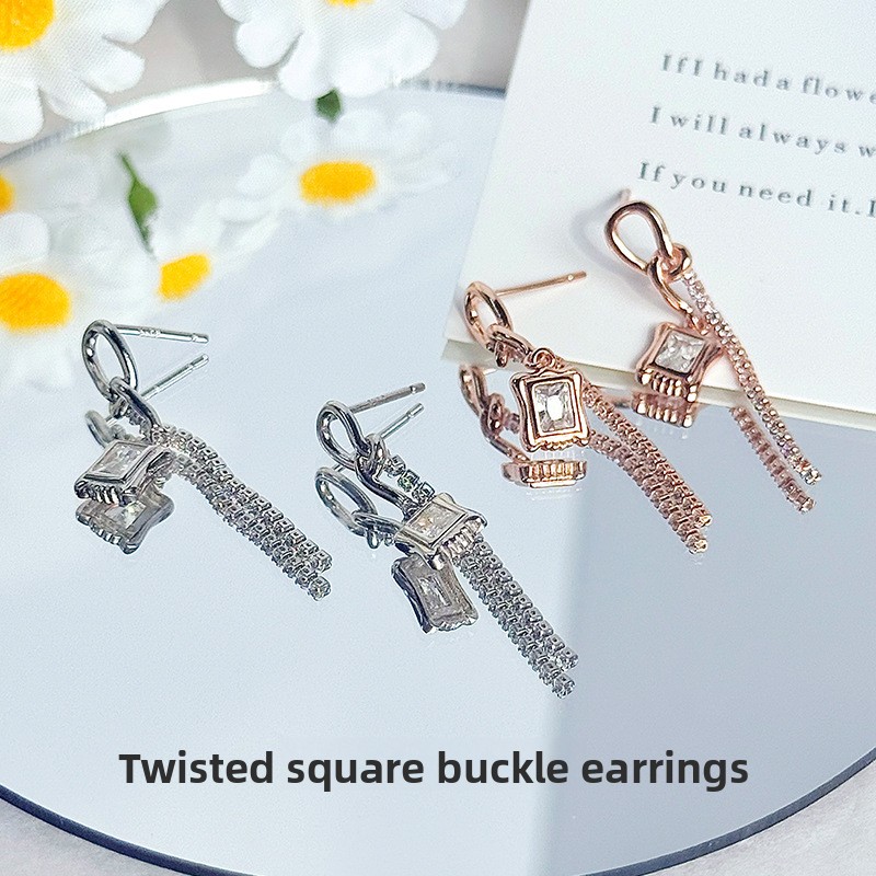 Original twisted cubic zirconia earrings, featuring a unique design, long tassel style, and a minimalist, cool aesthetic, made of 925 sterling silver