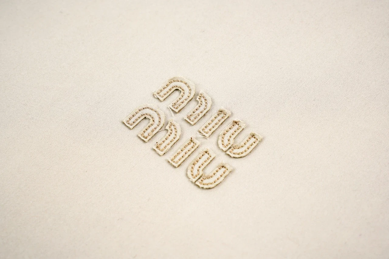 Miu Miu Beige Logo Red Check Lined Jacket product photo from LabelPicks