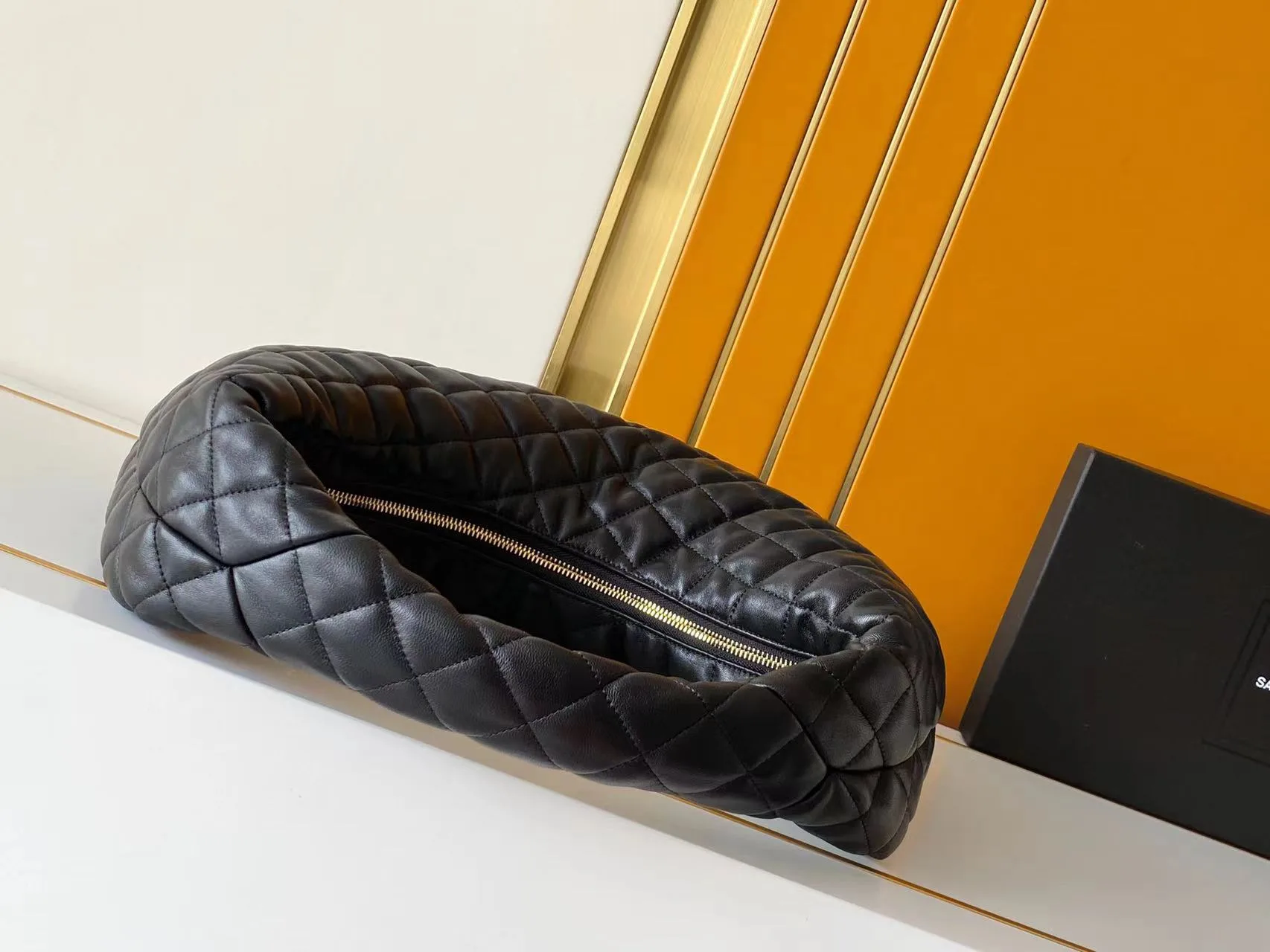 Saint Laurent Lambskin Icare Hobo Bag product photo from LabelPicks