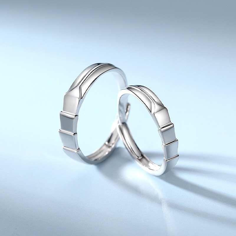 Simple and versatile couple rings for childhood sweethearts, featuring a diamond-shaped geometric bamboo design, made of pure silver