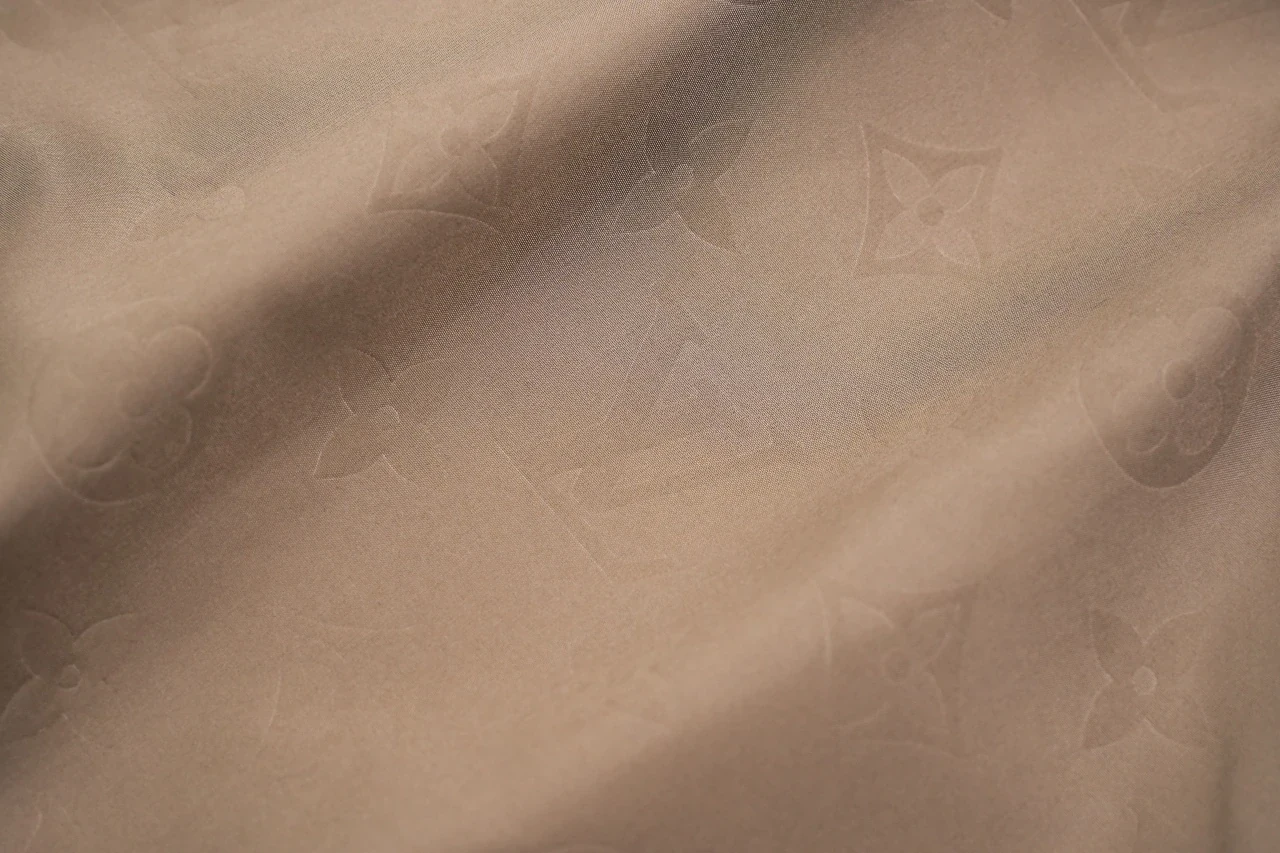 Louis Vuitton Khaki Embossed Hooded Padded Jacket product photo from LabelPicks
