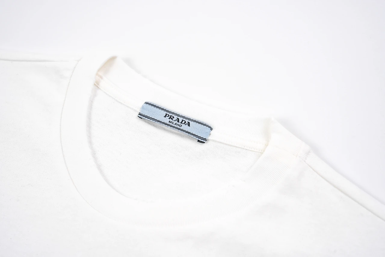 Prada White Distressed Badge Embroidered T-Shirt product photo from LabelPicks