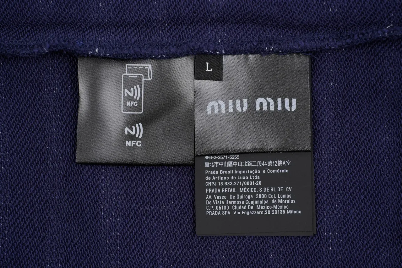 Miu Miu Navy Stripe Logo Half Zip Polo Sweatshirt product photo from LabelPicks