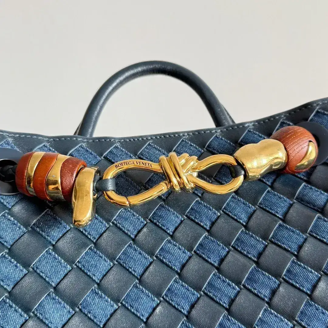Bottega Veneta Andiamo Navy Intrecciato Woven Leather Top Handle Bag product photo from LabelPicks