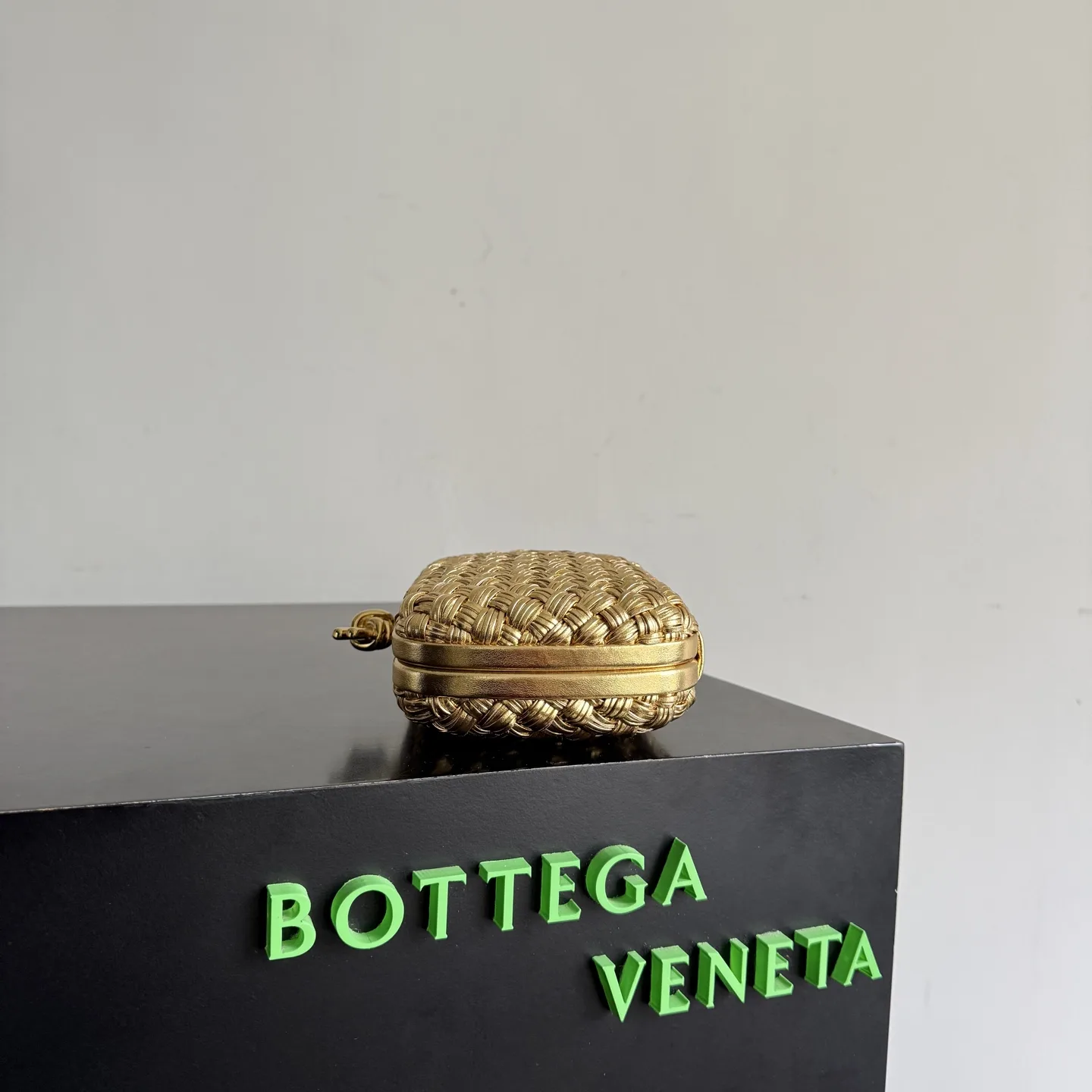 Bottega Veneta Intrecciato Woven Leather Knot Clutch product photo from LabelPicks