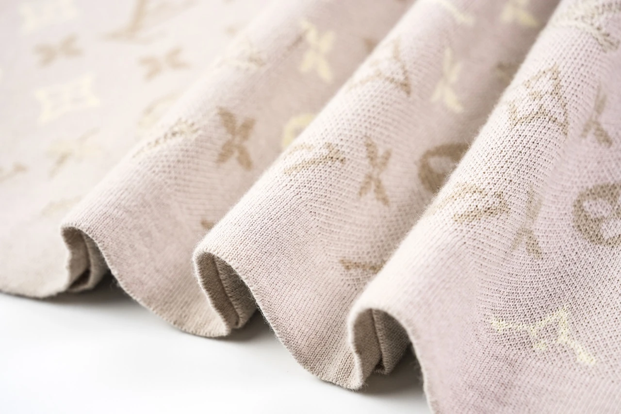 Louis Vuitton Beige Allover Jacquard Knit T-Shirt product photo from LabelPicks