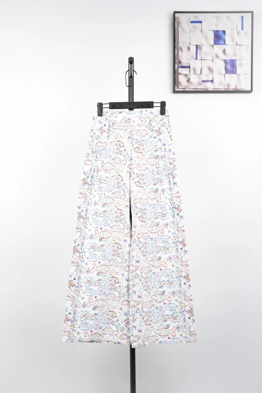 CHANEL Cream White Graffiti Straight-Leg Jeans product photo from LabelPicks