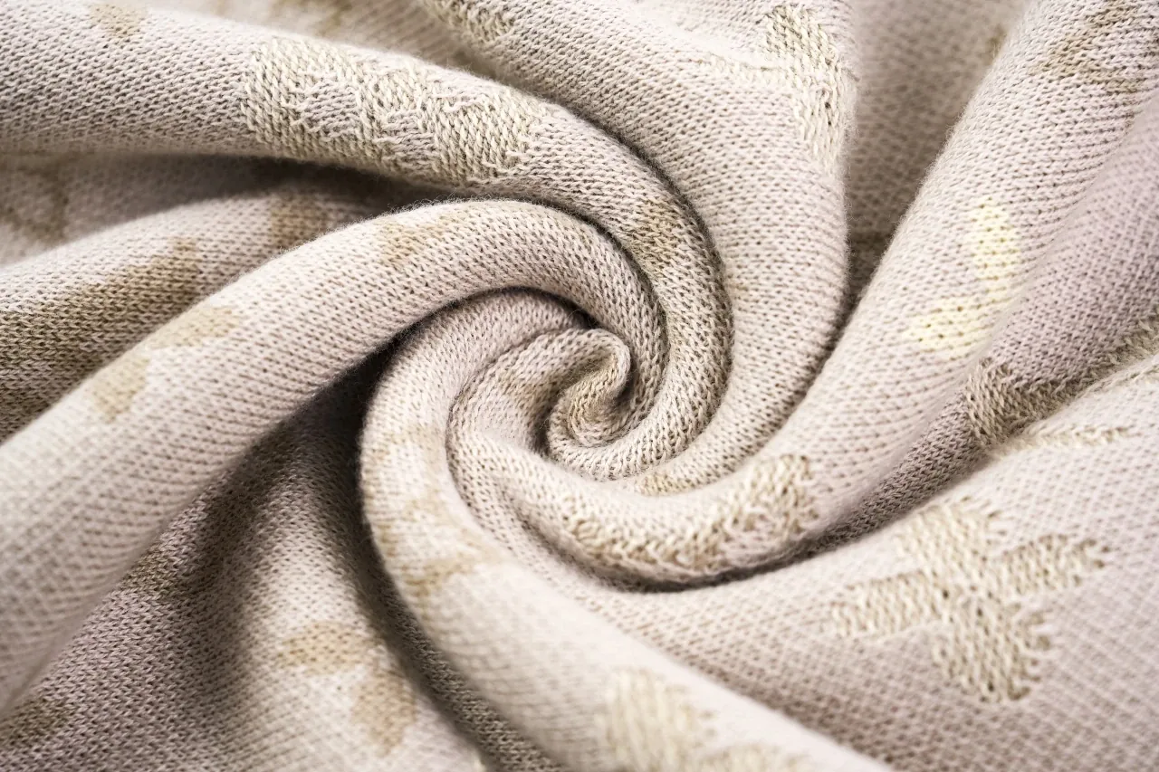 Louis Vuitton Beige Allover Jacquard Knit T-Shirt product photo from LabelPicks