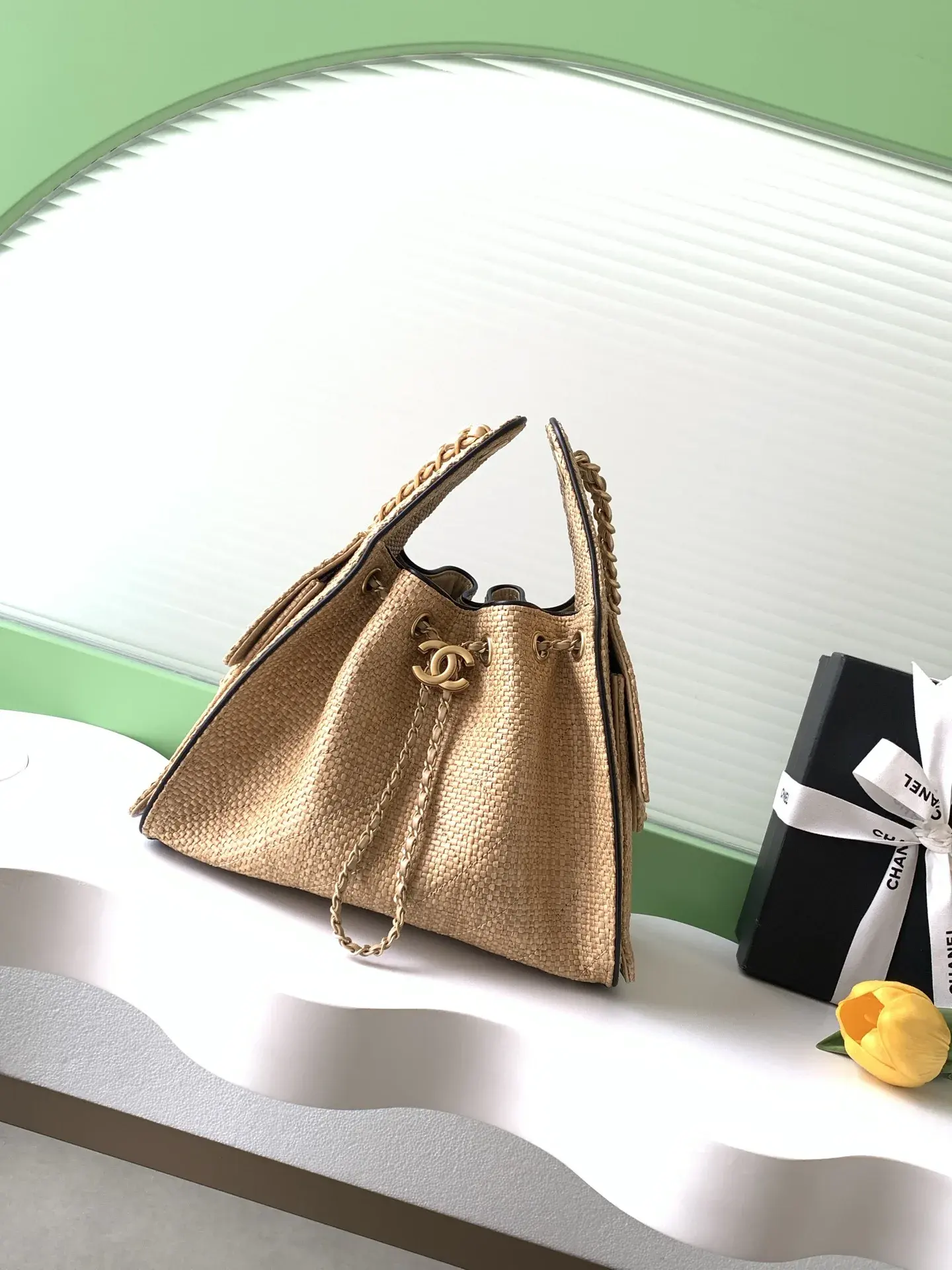 Chanel Black Straw Woven Bucket Bag product photo from LabelPicks