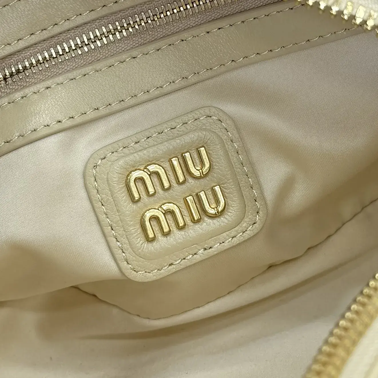 Miu Miu Lambskin Matelasse Top Handle Bag product photo from LabelPicks