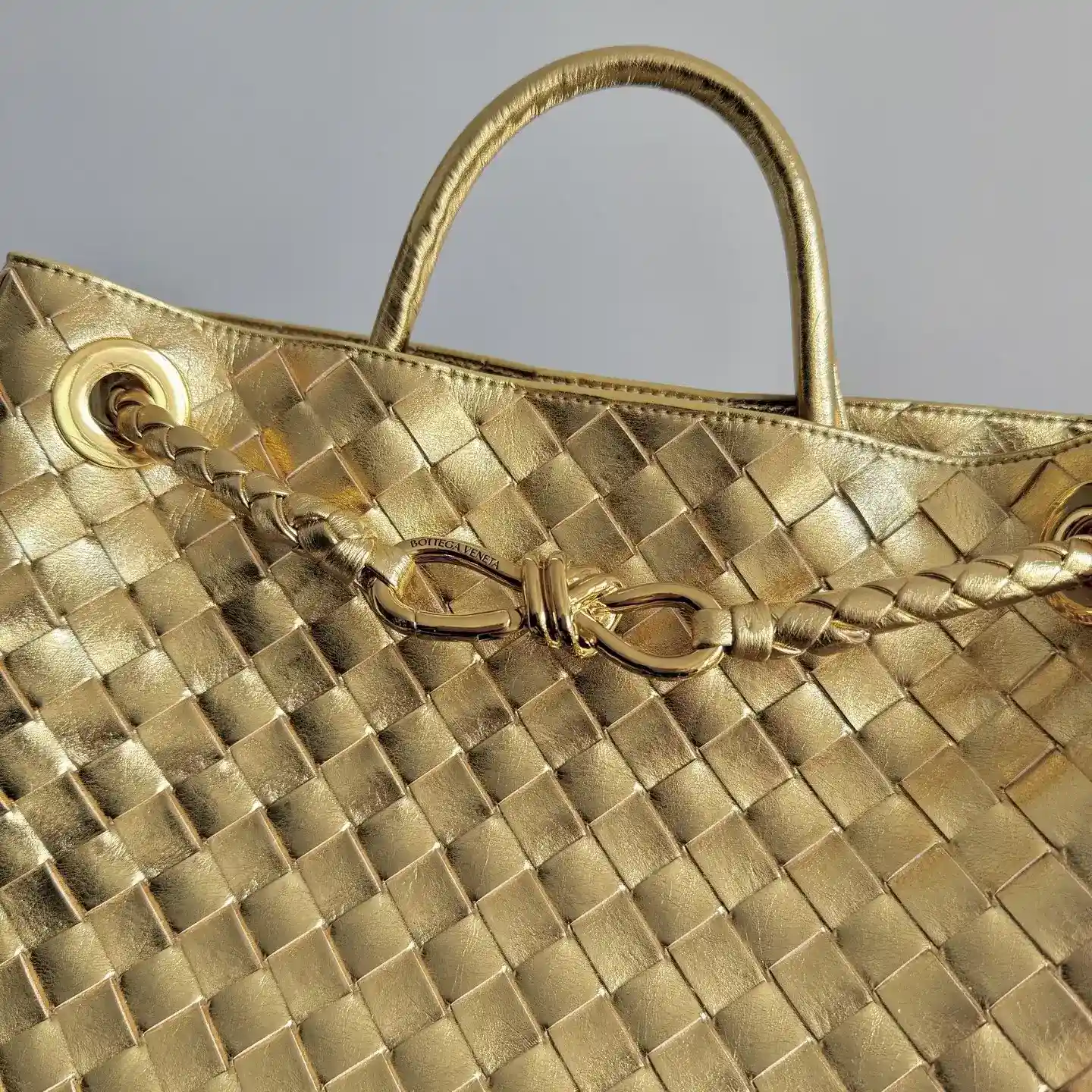 Bottega Veneta Gold Andiamo Intrecciato Woven Leather Top Handle Bag product photo from LabelPicks