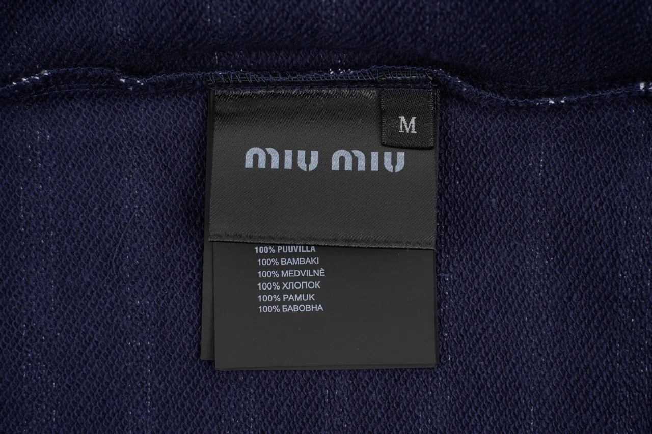 Miu Miu Navy Stripe Embroidered Half Zip Long Sleeve Polo Shirt product photo from LabelPicks
