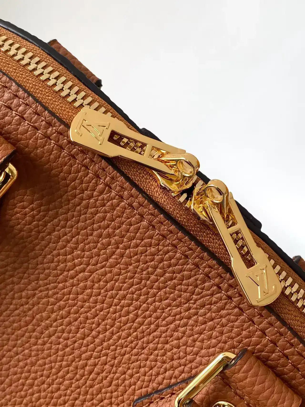 Louis Vuitton Alma Canvas and Leather Top Handle Bag product photo from LabelPicks