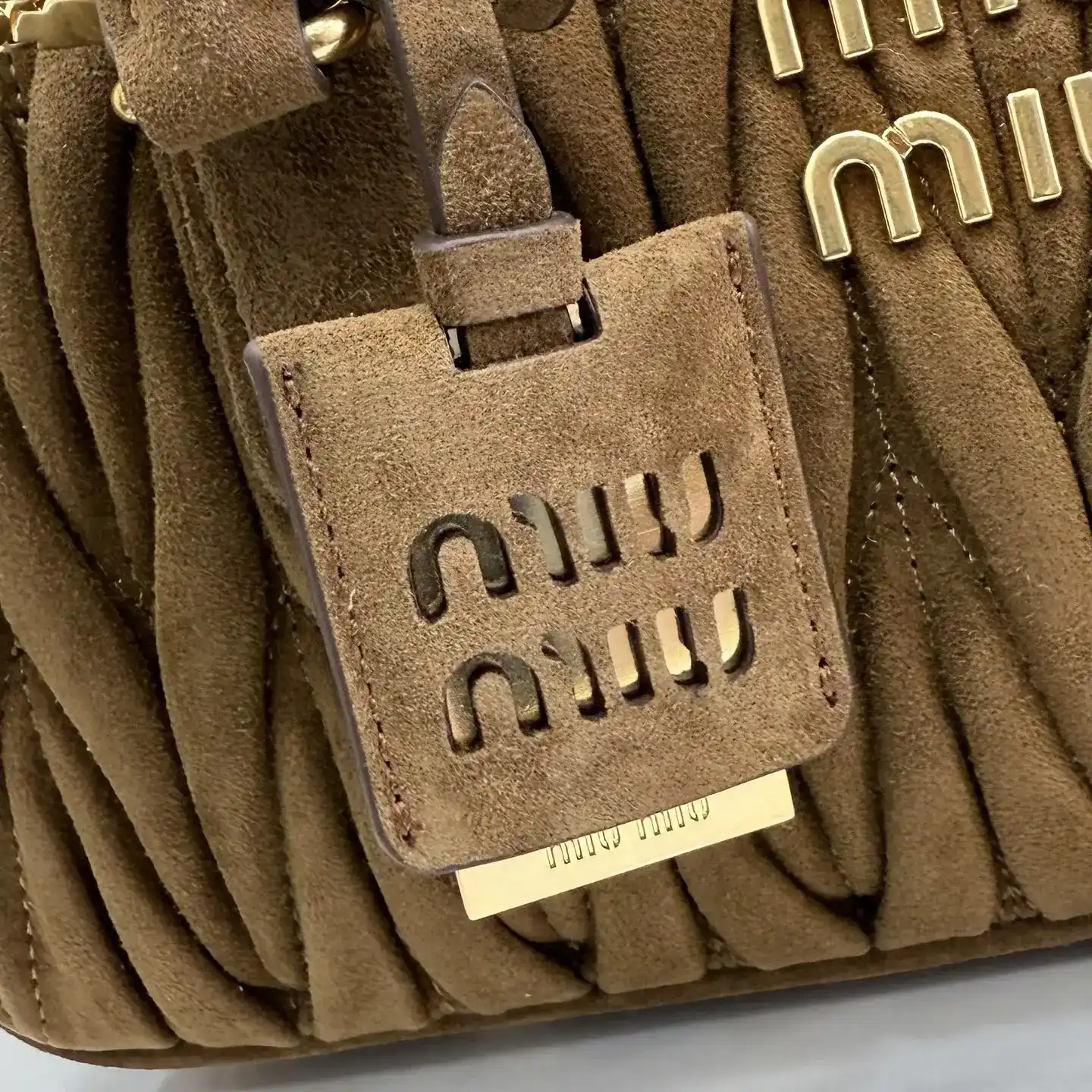 Miu Miu Matelasse Lambskin Top Handle Bag product photo from LabelPicks