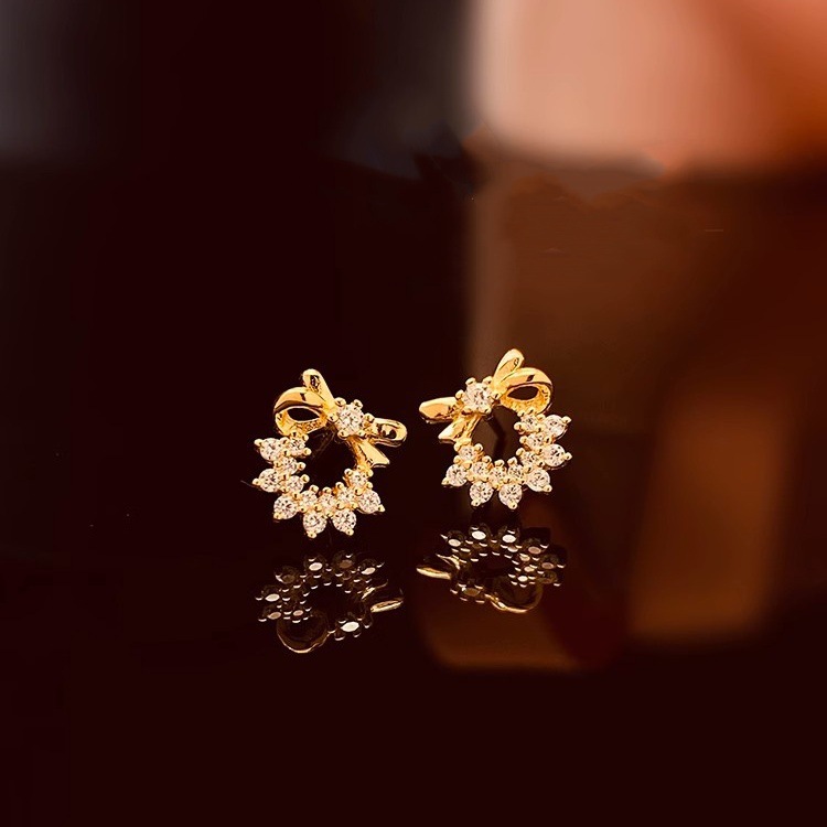 Korean-style, lightweight luxury S925 sterling silver butterfly knot star ring earrings, women's silver needle earrings, niche design, high-end earrings
