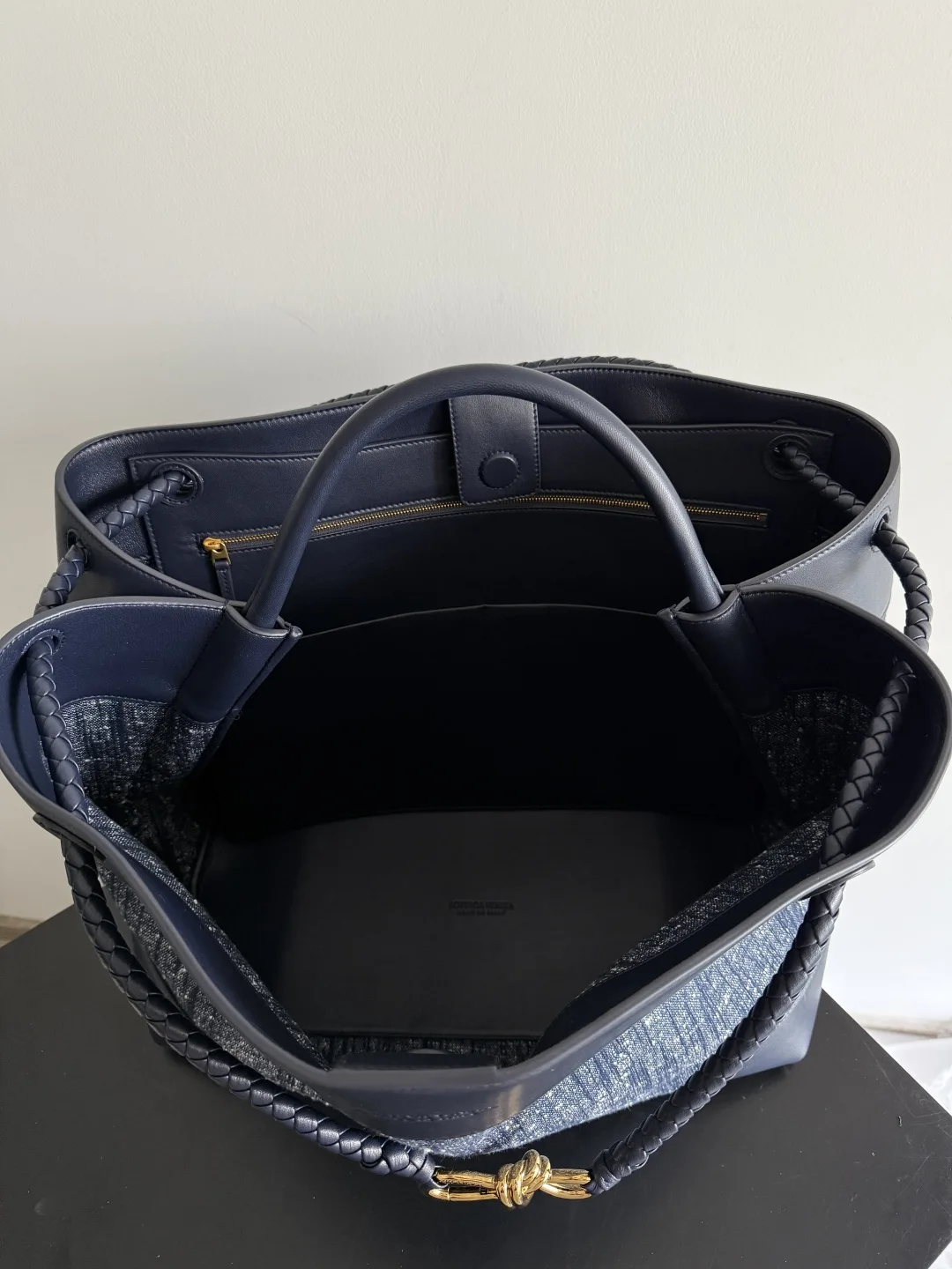 Bottega Veneta Andiamo Blue Intrecciato Woven Leather Top Handle Bag product photo from LabelPicks