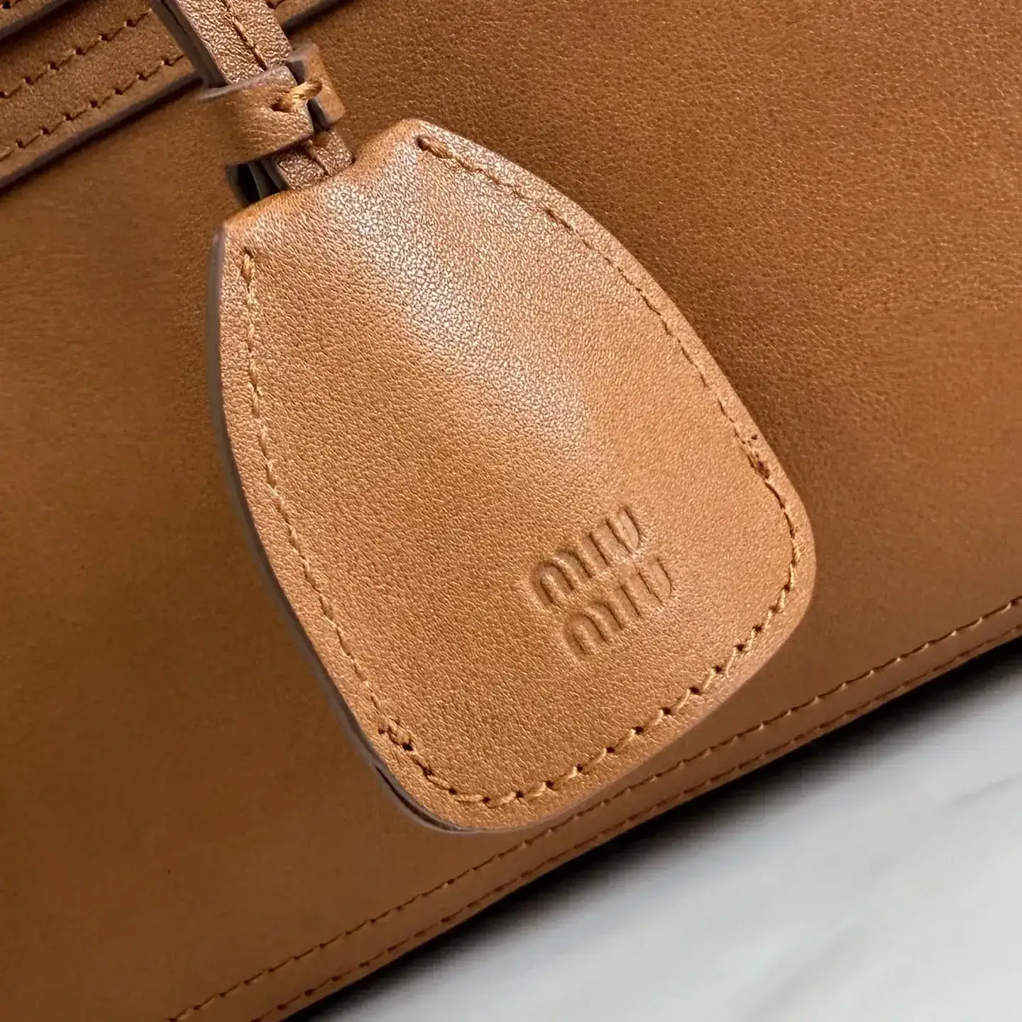 Miu Miu Lambskin Vivant Top Handle Bag product photo from LabelPicks
