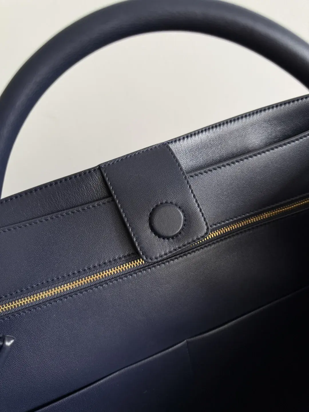 Bottega Veneta Andiamo Blue Intrecciato Woven Leather Top Handle Bag product photo from LabelPicks