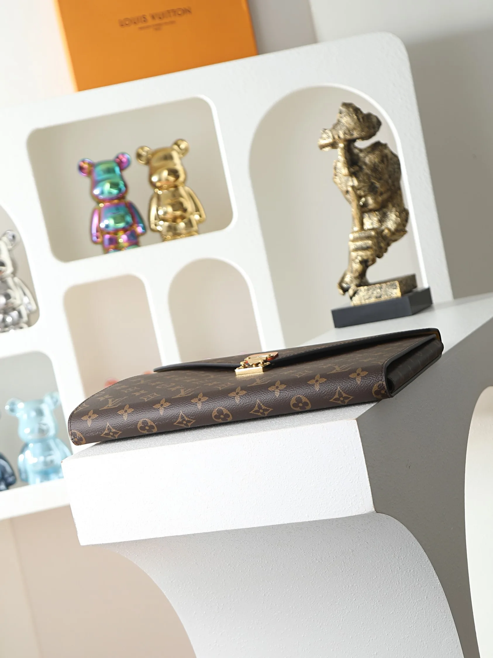 Louis Vuitton Brown Monogram Canvas Clutch product photo from LabelPicks