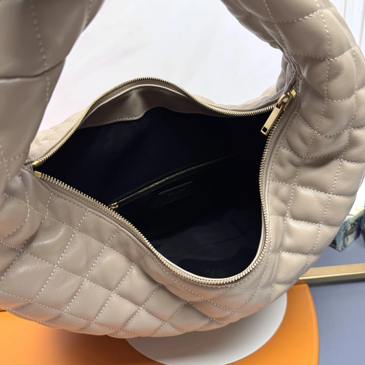 Saint Laurent Icare Beige Lambskin Hobo Bag product photo from LabelPicks
