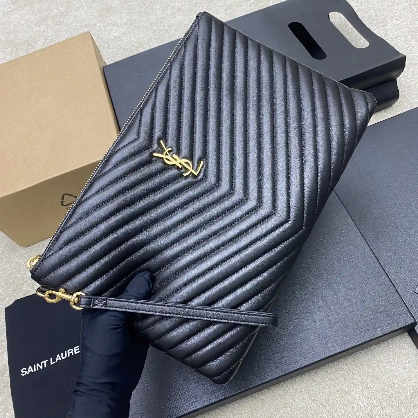 Saint Laurent Quilted Leather Clutch product photo from LabelPicks