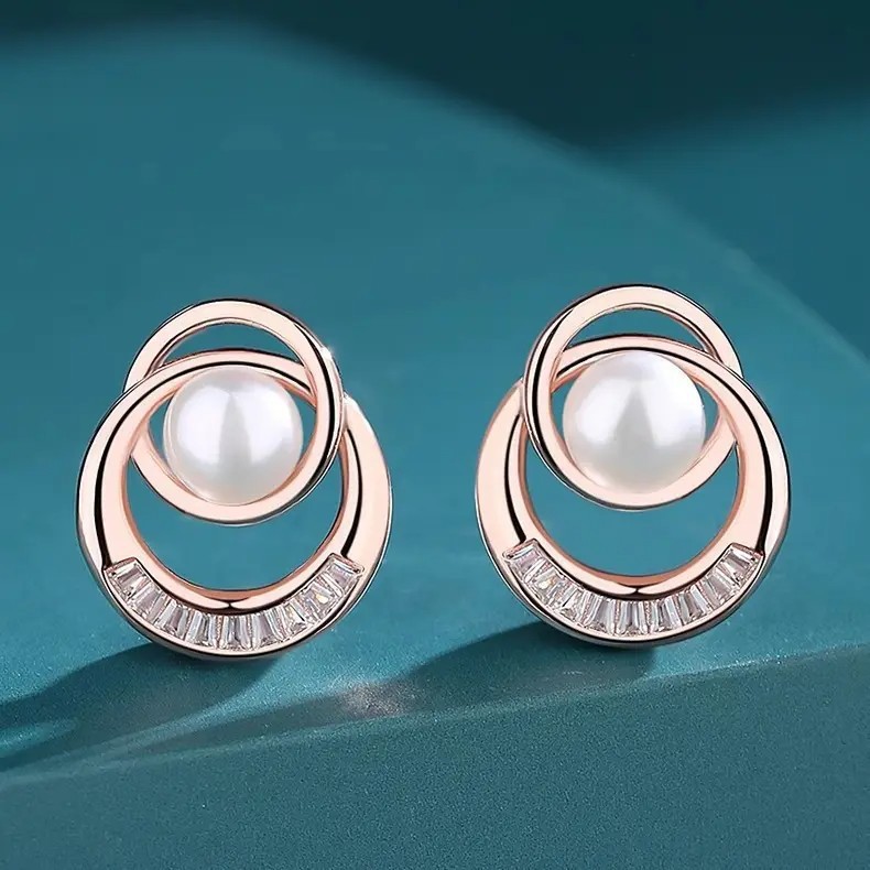 S925 sterling silver pearl earrings, featuring a delicate and luxurious French-style design with a unique and stylish ring clasp, perfect for adding a touch of elegance to your look