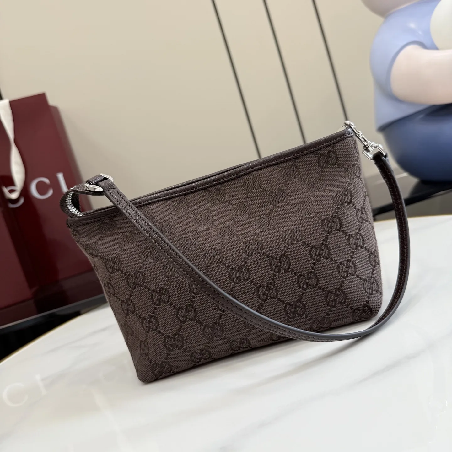 Gucci Brown Generation Canvas and Leather Clutch product photo from LabelPicks