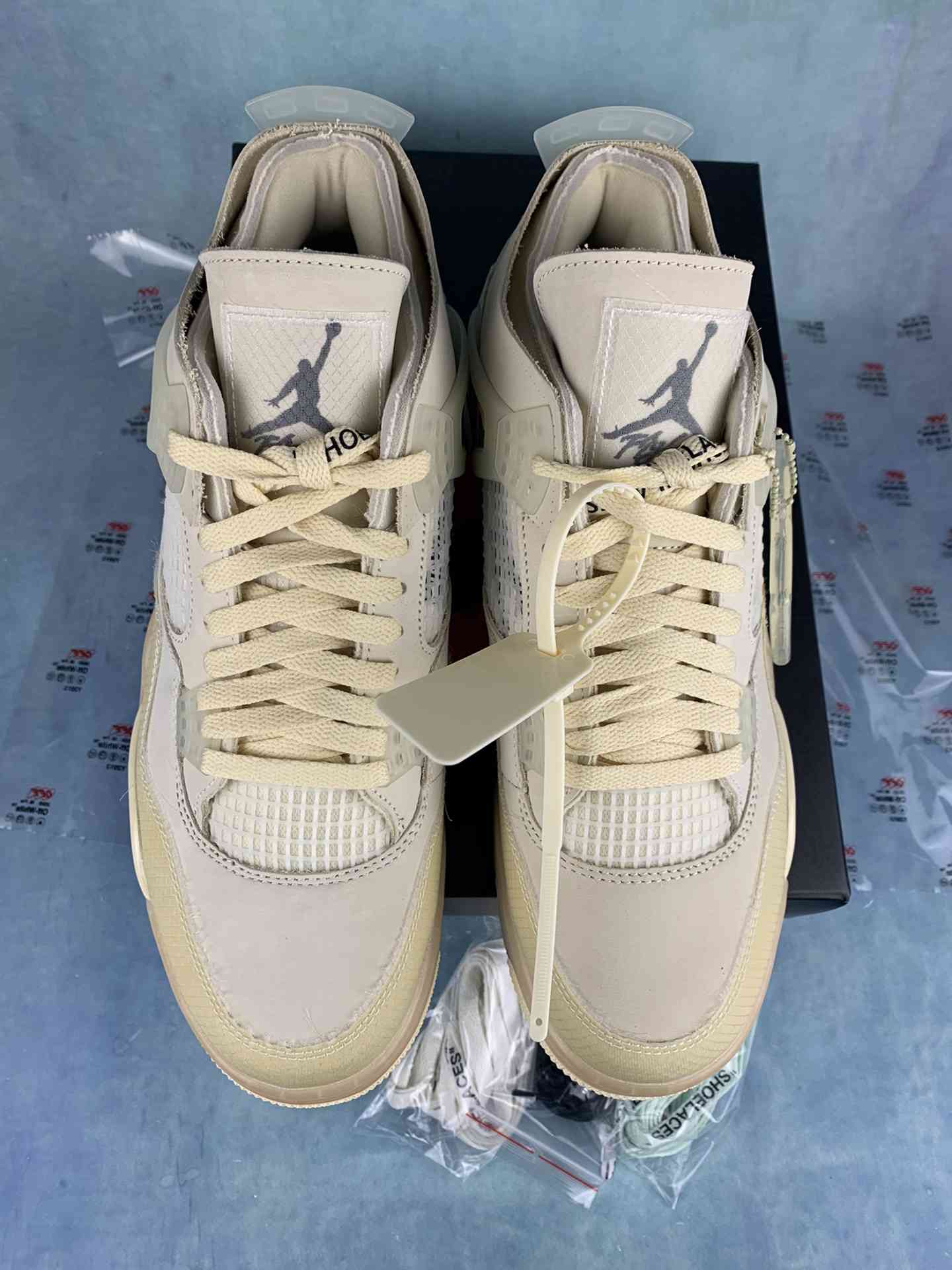 Off-White x Air Jordan 4 “Sail” Shoes