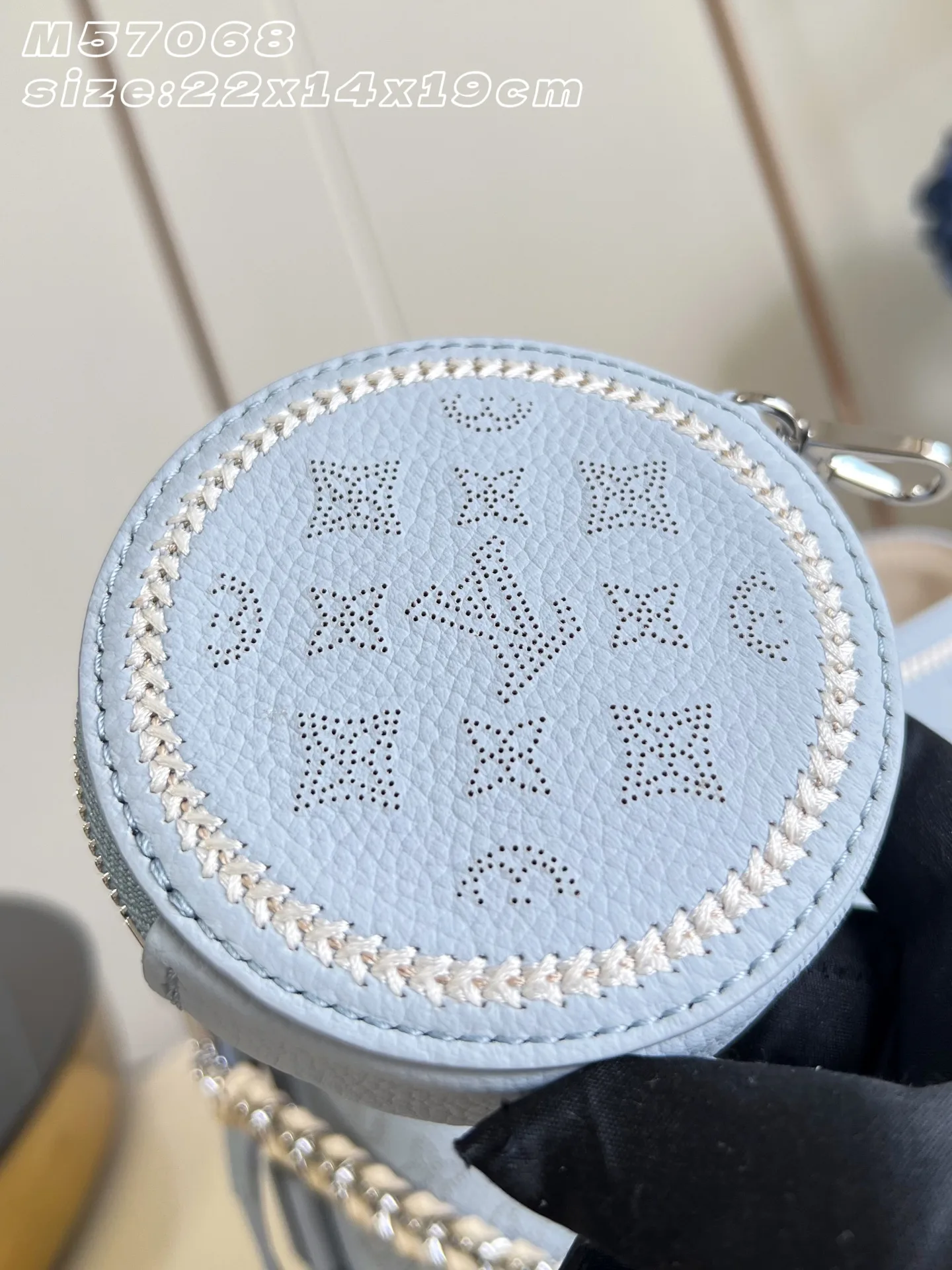 Louis Vuitton Woven Leather Bucket Bag product photo from LabelPicks