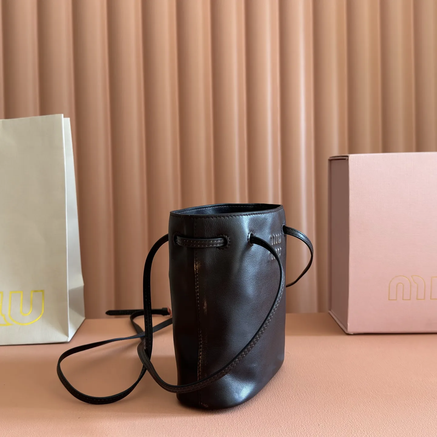 Miu Miu Lambskin Bucket Bag product photo from LabelPicks