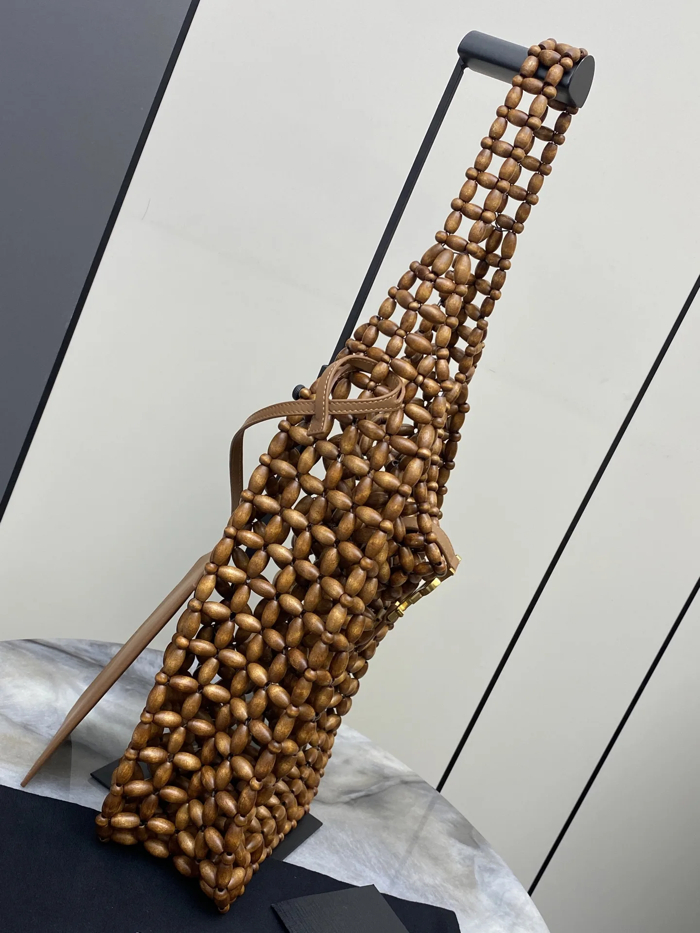 Saint Laurent Woven Leather Shoulder Bag product photo from LabelPicks