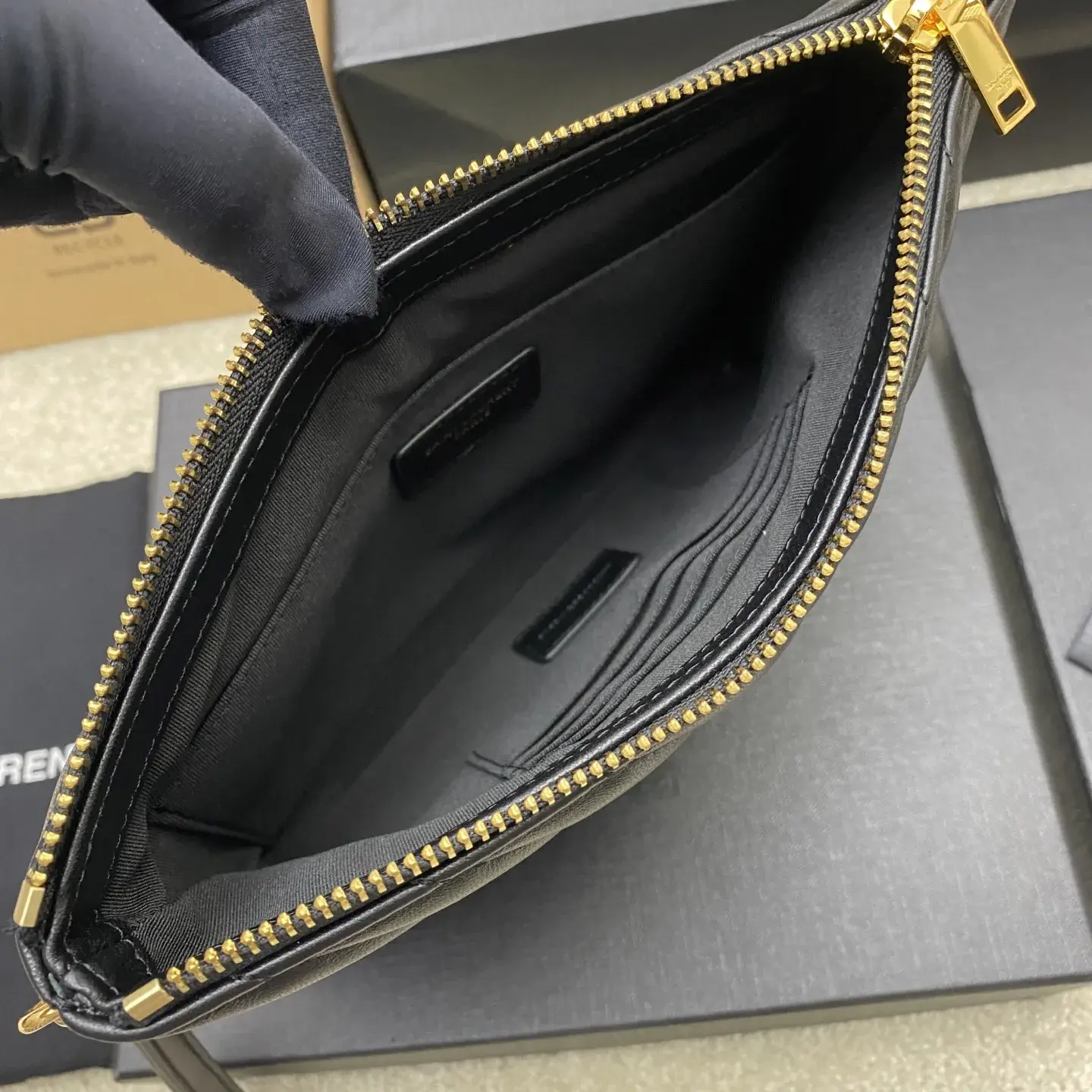 Saint Laurent Black Quilted Leather Clutch product photo from LabelPicks