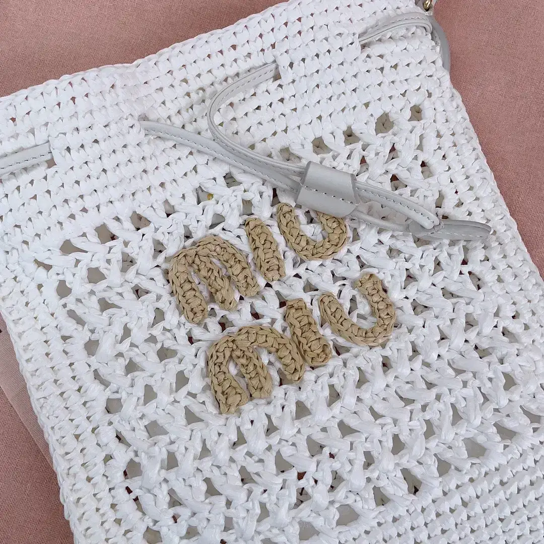 Miu Miu Woven Leather Bucket Bag product photo from LabelPicks