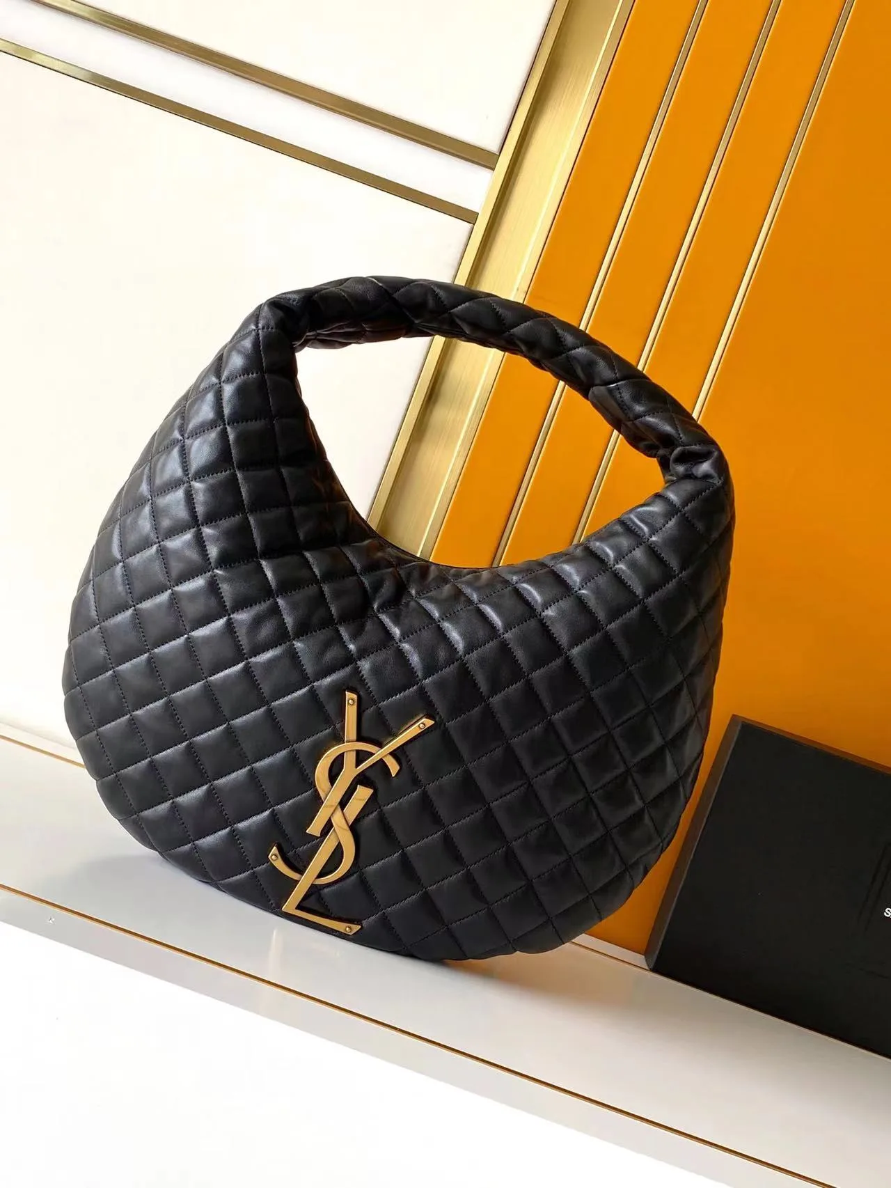 Saint Laurent Lambskin Icare Hobo Bag product photo from LabelPicks