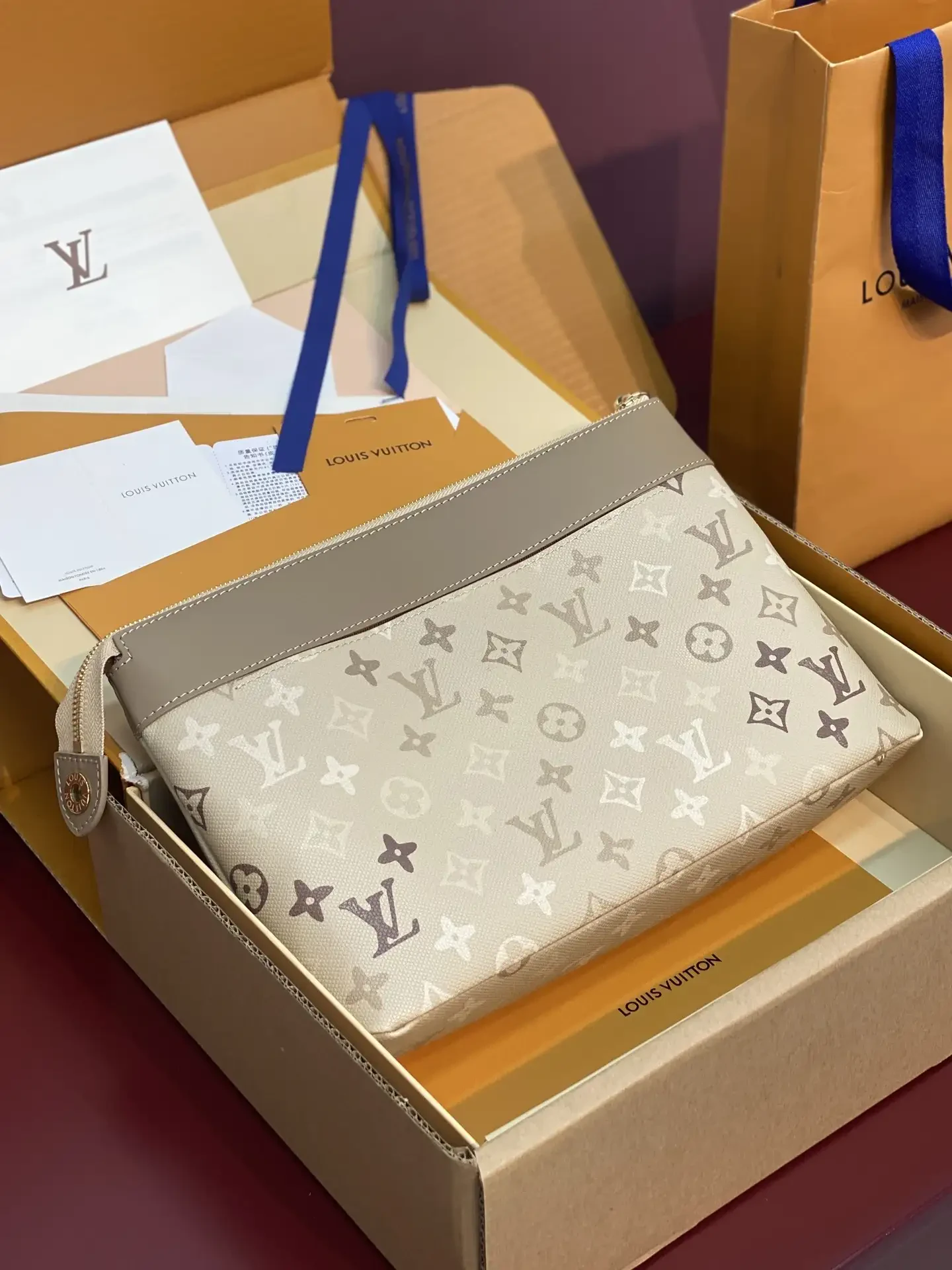 Louis Vuitton Red Pochette Canvas and Leather Clutch product photo from LabelPicks