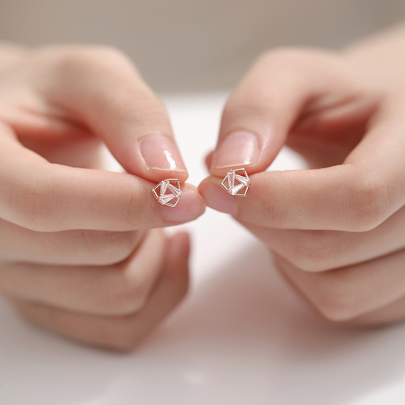 New geometric triangle earrings for women, featuring a minimalist and delicate design with micro-paved cubic zirconia stones, trendy hollow-out earrings