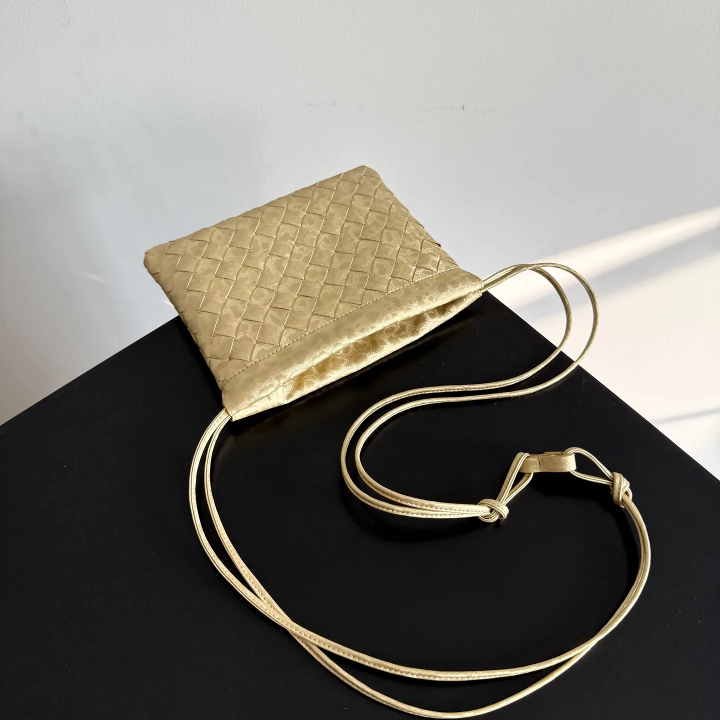 Bottega Veneta Dustbag Intrecciato Woven Leather Bucket Bag product photo from LabelPicks