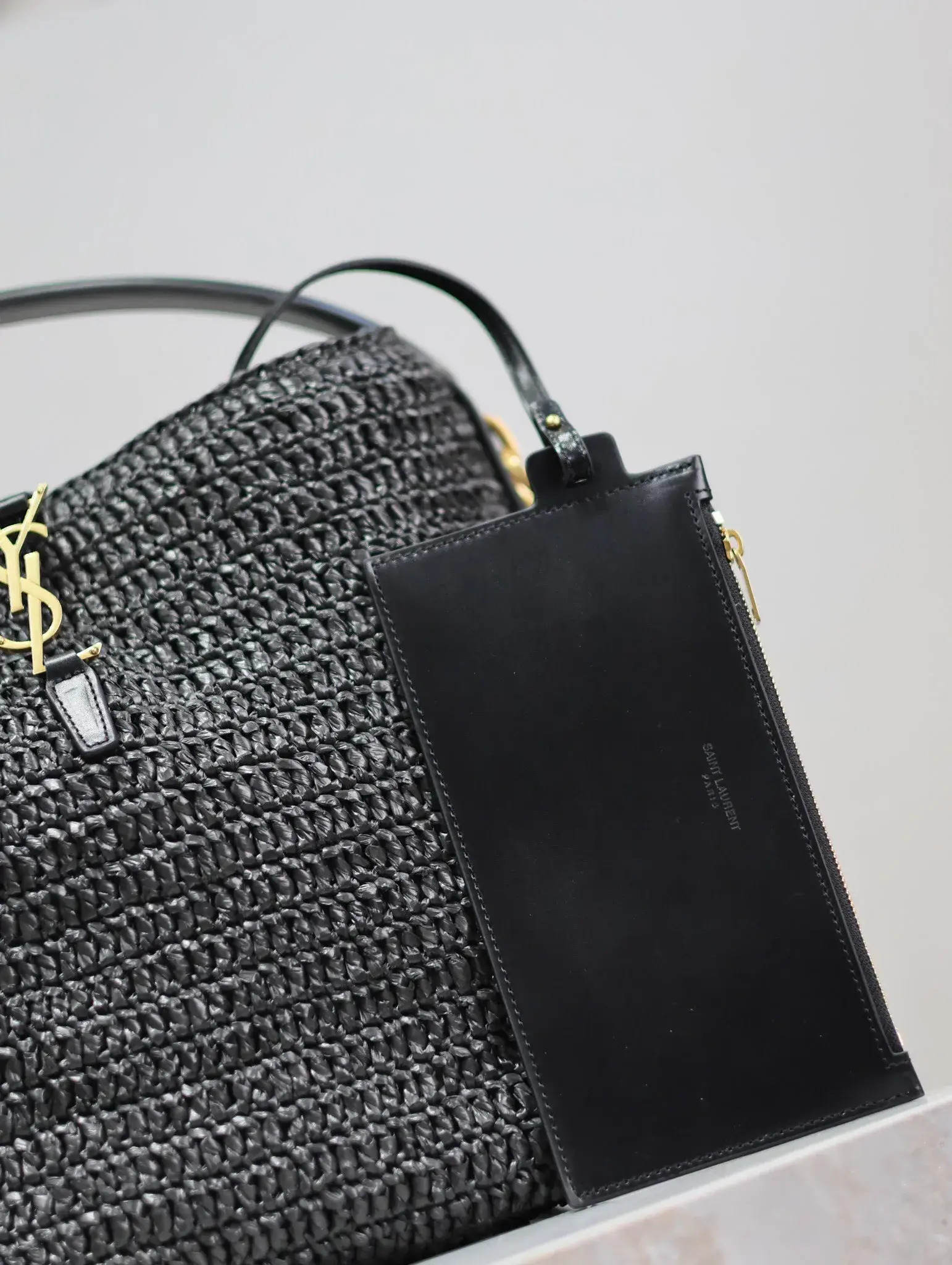 Saint Laurent Black Straw Woven Bucket Bag product photo from LabelPicks