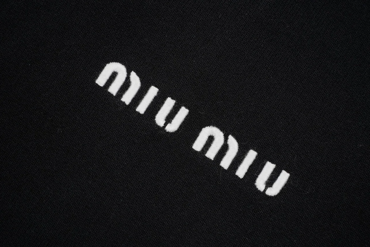 Miu Miu Black Logo Half Zip Fleece Sweatshirt product photo from LabelPicks