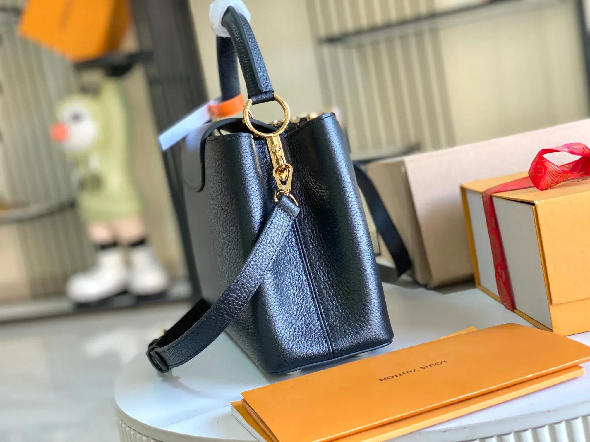 Louis Vuitton Capucines Black Grained Leather Crossbody Bag product photo from LabelPicks
