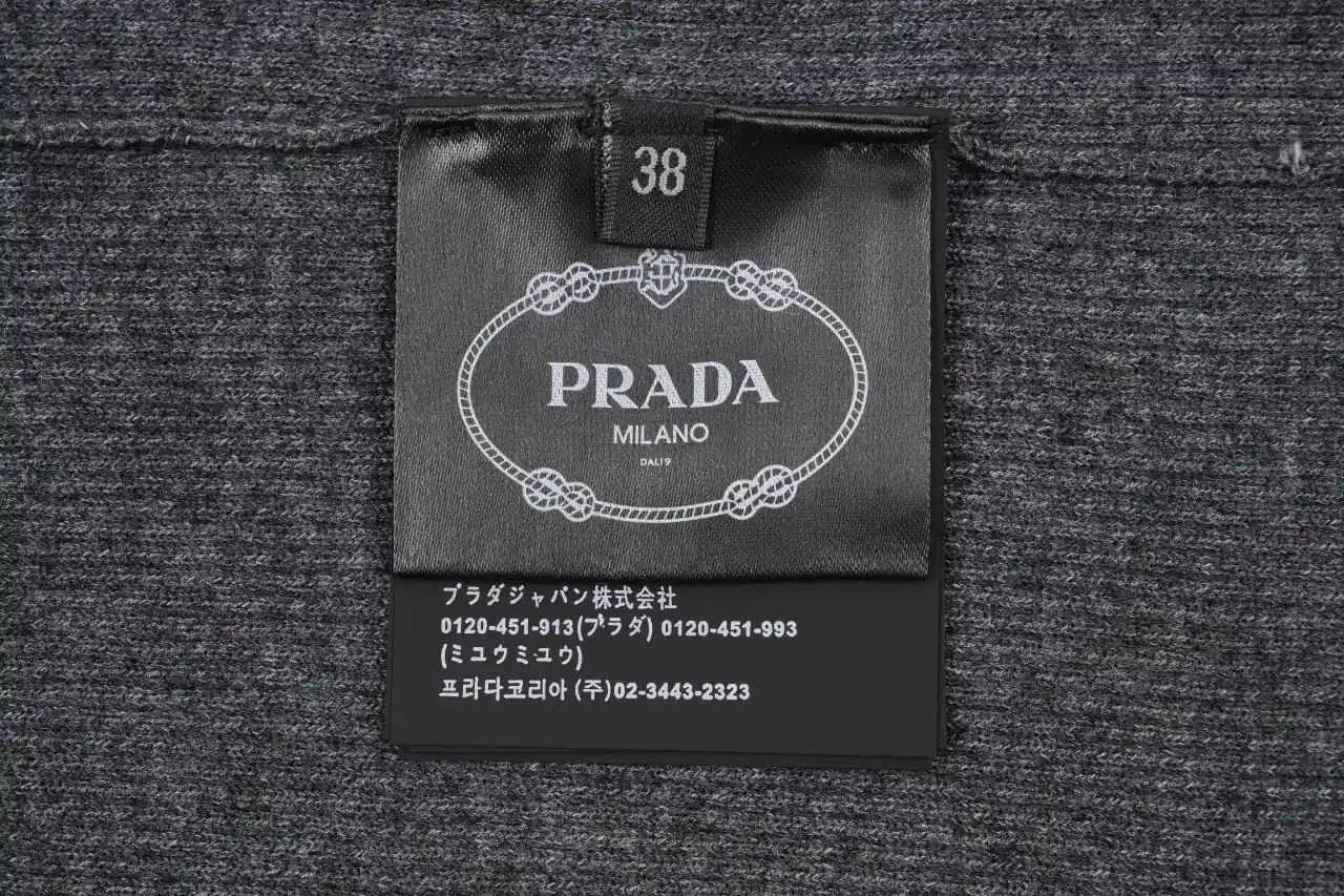 Prada Charcoal Logo Embroidered Half-Sleeve Knit Top product photo from LabelPicks