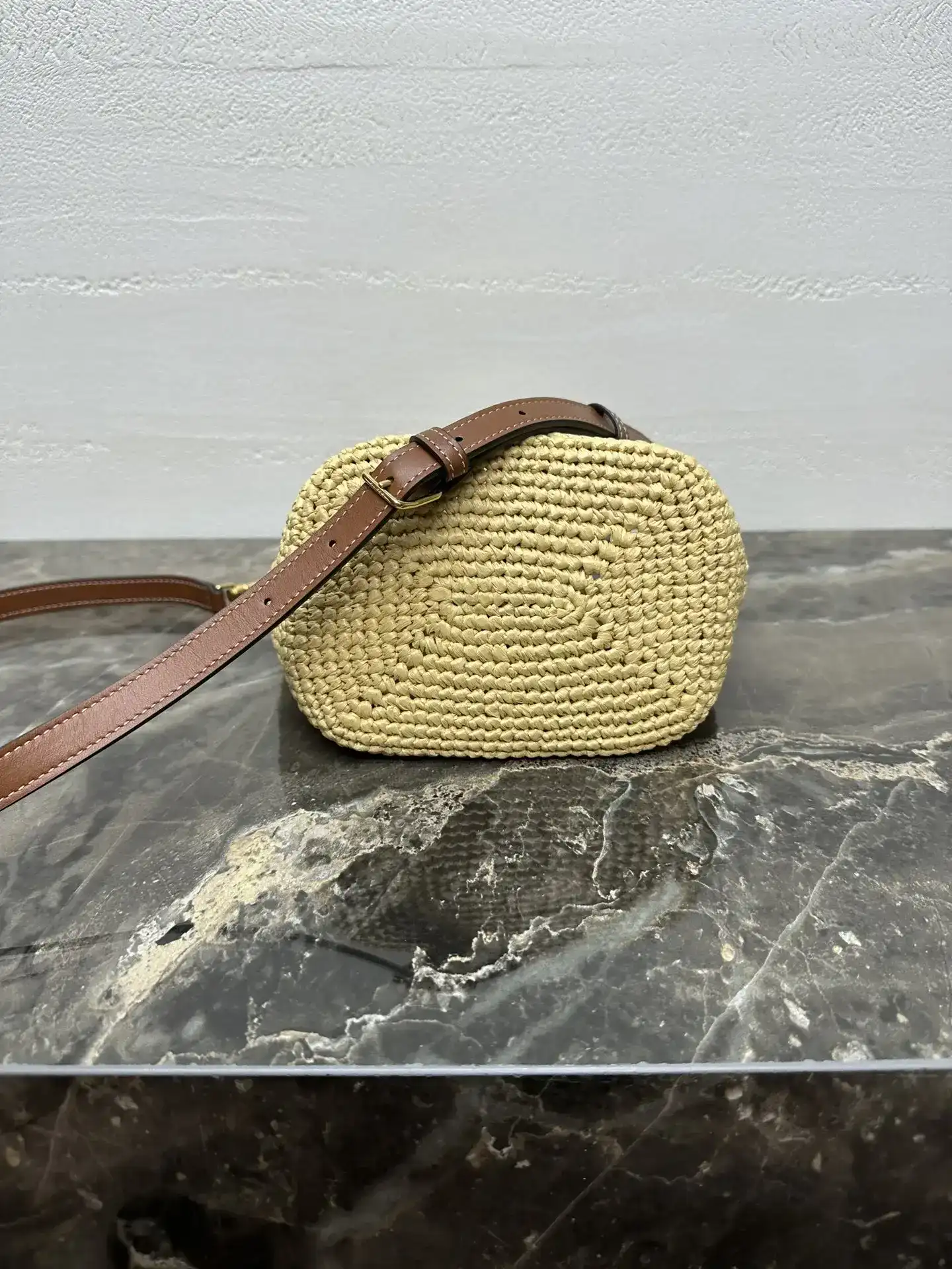 Celine Louise Woven Leather Bucket Bag product photo from LabelPicks