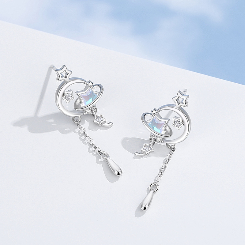 Original Korean-style star earrings for women, made of pure silver, featuring a fresh and delicate design with tassels, perfect for summerKorean-style moonstone earrings, a trendy accessory